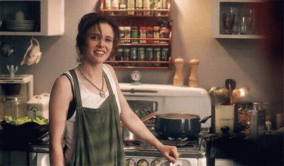 Woman In Kitchen With Pot Saying Utensil GIF