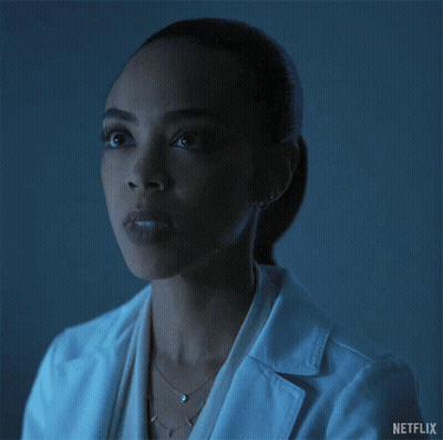 Woman In Lab Coat Blowing Kiss GIF