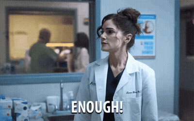 Woman In Lab Coat Saying Enough In Hospital GIF