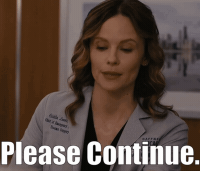 Woman in Lab Coat Saying Please Continue