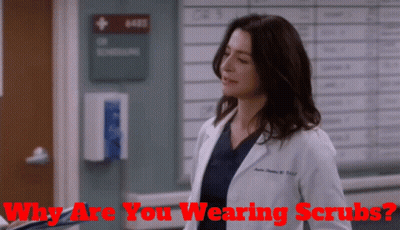 Woman In Lab Coat Saying Why Are You Wearing Scrubs GIF
