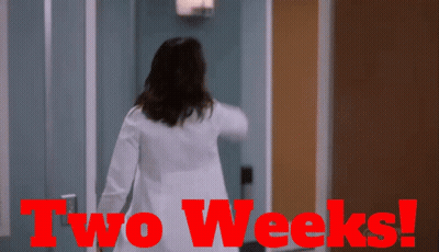 Woman In Lab Coat Walking Through Door Saying Two Weeks GIF