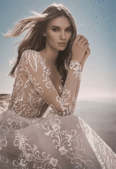 Woman In Lace Dress Looking At Camera GIF