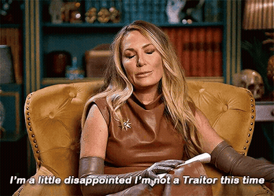 Woman In Leather Dress Saying I'm A Little Disappointed I'm Not A Traitor GIF