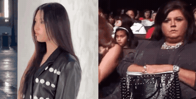 Woman In Leather Jacket Beside Woman With Purse GIF