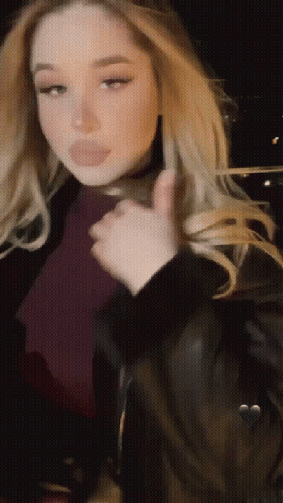 Woman In Leather Jacket Giving Thumbs Up GIF