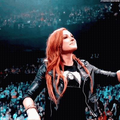 Woman In Leather Jacket In Front Of Crowd 212 GIF