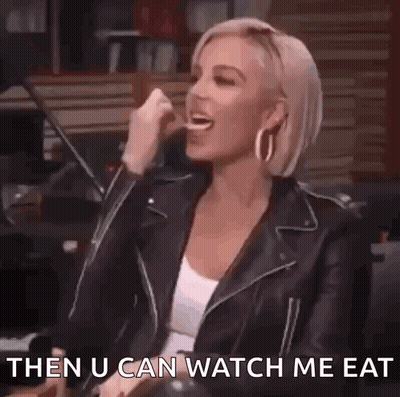 Woman In Leather Jacket Laughing Saying Then U Can Watch Me Eat GIF