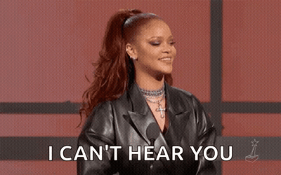 Woman In Leather Jacket Making Funny Face Saying I Can't Hear You GIF