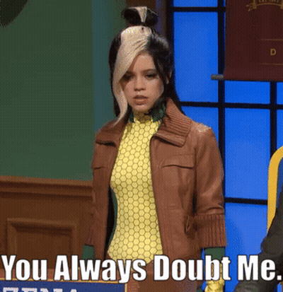 Woman In Leather Jacket Next To Doubt Sign GIF