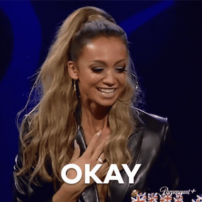 Woman In Leather Jacket Saying Okay GIF