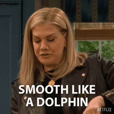 Woman In Leather Jacket Saying Smooth Like A Dolphin GIF