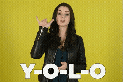 Woman In Leather Jacket Says YOLO GIF