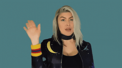 Woman In Leather Jacket Waving GIF