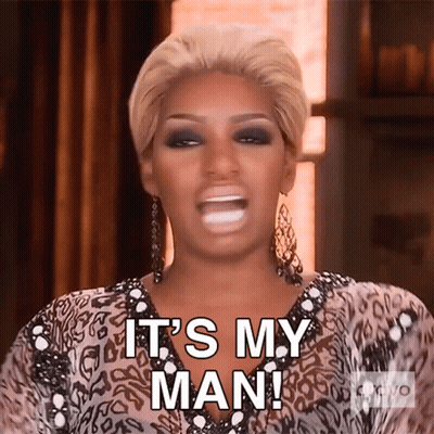 Woman In Leopard Print Dress Saying It's My Man GIF