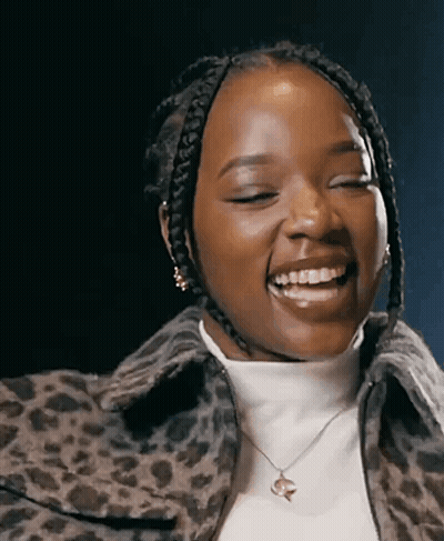 Woman In Leopard Print Jacket And Necklace GIF