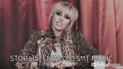 Woman In Leopard Print Jacket Talking Into Microphone GIF
