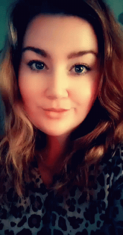 Woman In Leopard Print Shirt Close Up GIF