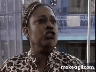 Woman In Leopard Print Shirt Making A Face GIF