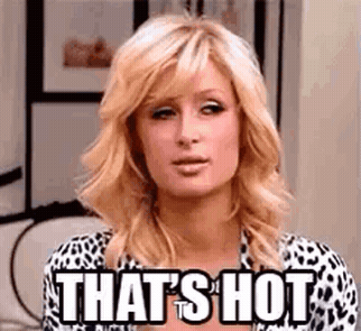 Woman in Leopard Print Shirt Saying That's Hot
