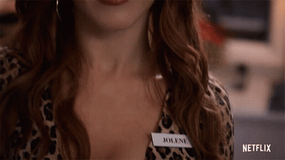 Woman In Leopard Print Shirt With Name Tag GIF