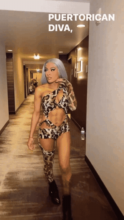 Woman In Leopard Print Walking Hallway Puerto Rican Diva GIF