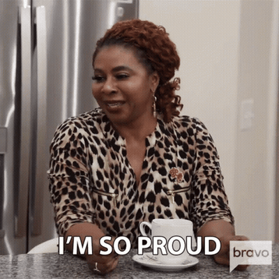 Woman In Leopard Shirt With Coffee Says I'm So Proud GIF