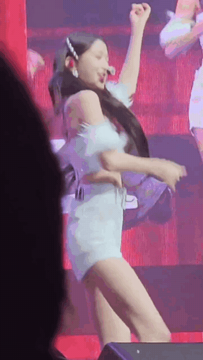 Woman In Light Blue Dress Dancing On Stage GIF