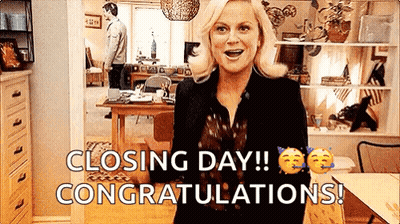 Woman In Living Room Saying Closing Day Congratulations GIF