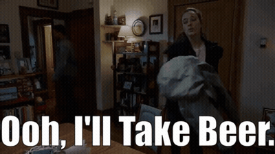 Woman In Living Room Saying Ooh I'll Take Beer GIF
