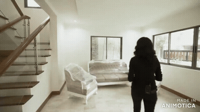 Woman In Living Room With Couch And Chairs Made In Animatica GIF
