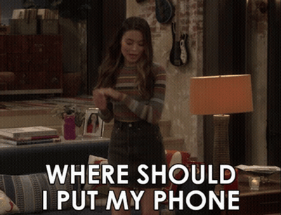 Woman In Living Room With Where Should I Put My Phone GIF