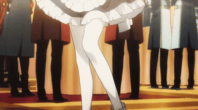 Woman In Maid Costume Standing In Crowd GIF