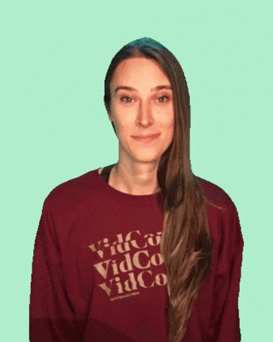 Woman In Maroon Vidco Shirt GIF