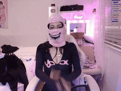 Woman In Mask And Minions 2 Shirt At Window GIF