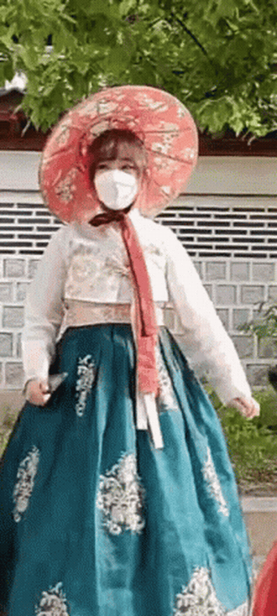 Woman In Mask And Traditional Korean Dress GIF