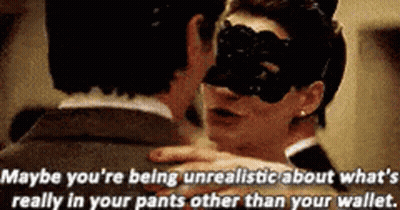 Woman In Mask Hugging Man In Suit GIF
