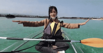 Woman In Mask Sitting In Clear Kayak GIF