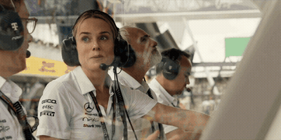 Woman In Mercedes Shirt Talking Into Headset GIF