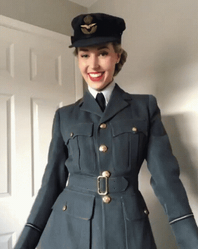 Woman In Military Uniform Smiling GIF