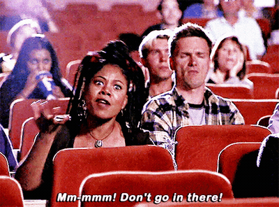 Woman In Movie Theater Saying Mm-Mmm Don't Go In There GIF