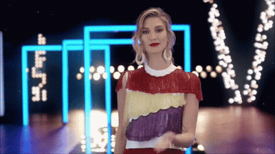 Woman In Multicolored Top With I Love You Lights GIF