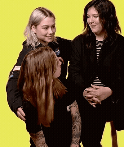 Woman In NASA Shirt Hugging Two Women GIF