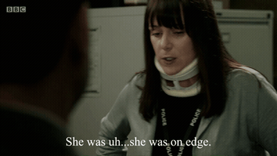 Woman In Neck Brace And BBC Lanyard Talking To Man GIF