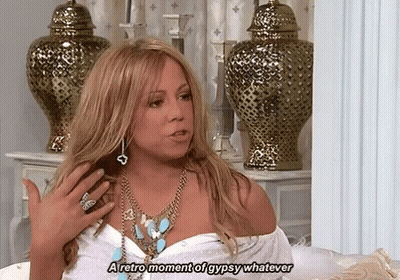 Woman In Necklace And White Shirt Talking About Retro Gypsy Moment GIF