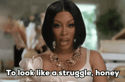 Woman In Necklace And White Tank Top Says To Look Like A Struggle Honey GIF
