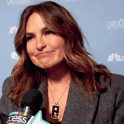 Woman In Necklace Talking Into Microphone Law & Order GIF