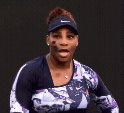Woman In Nike Visor And Necklace GIF