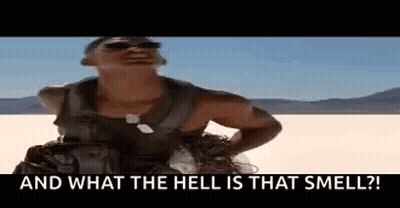 Woman In Ninja Turtles Shirt Next To Another Woman GIF