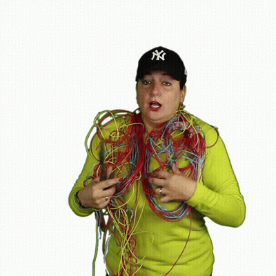 Woman In NY Hat Holding Pliers And Wires GIF